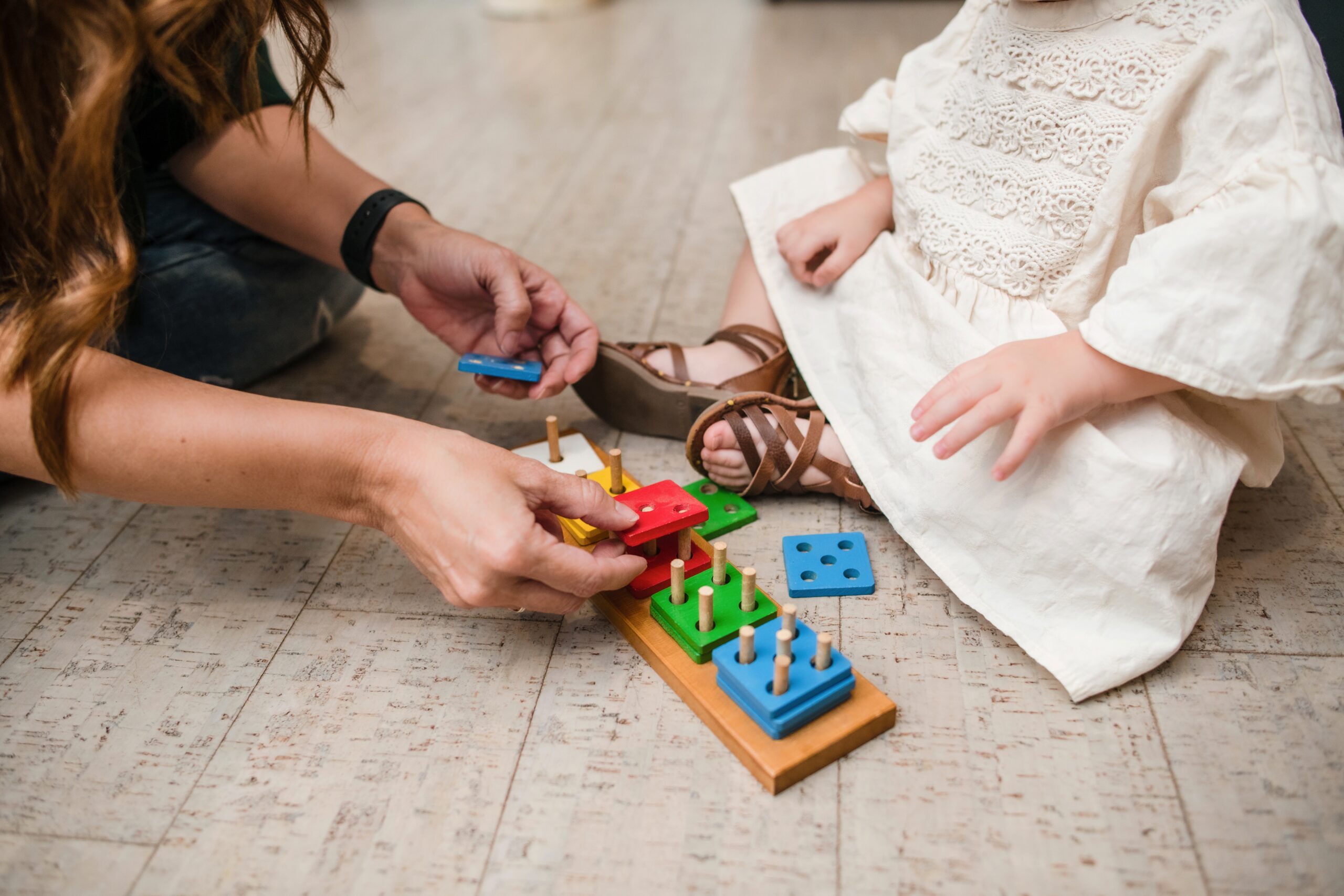 mother and child playing with toy